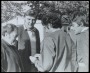 Image of : Photograph - Richard O'Sullivan signs an autograph for Sid McGuinness, groundsman